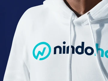 Nindohost logo applied to a white hoodie