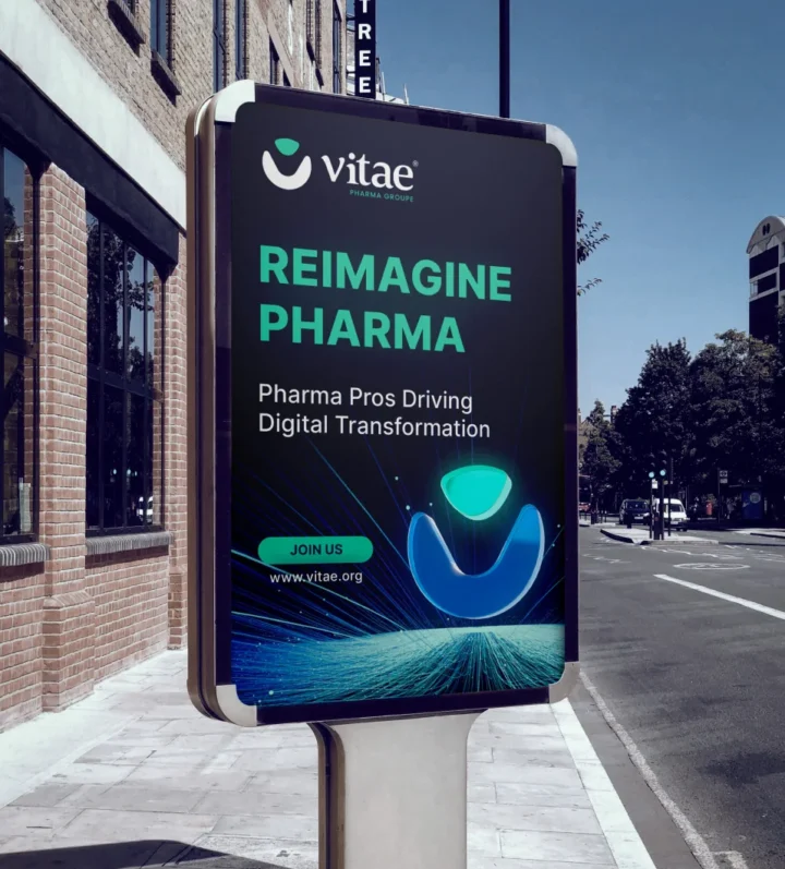 Vitae Reimagine Pharma campaign on a city billboard.