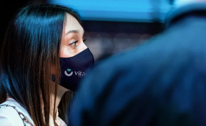 Vitae branded mask worn at an event.